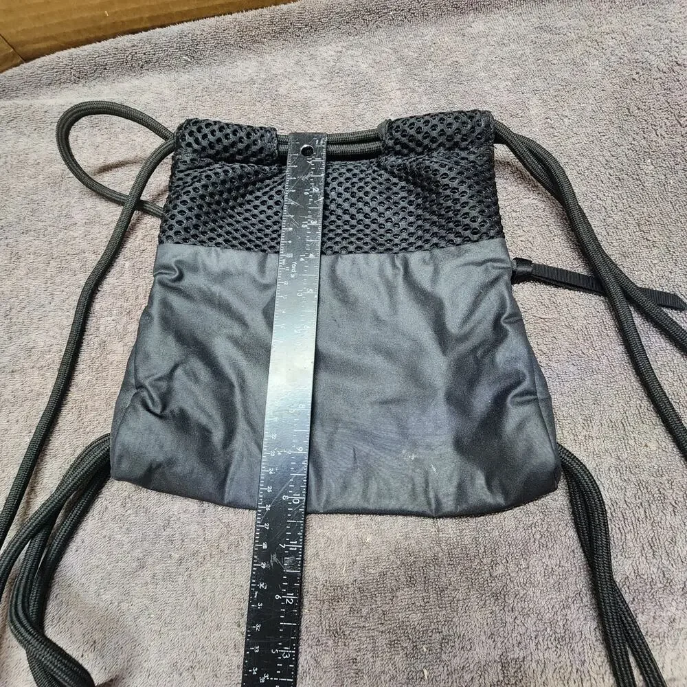 Black Nike slingbag small vinyl mesh backpack p1